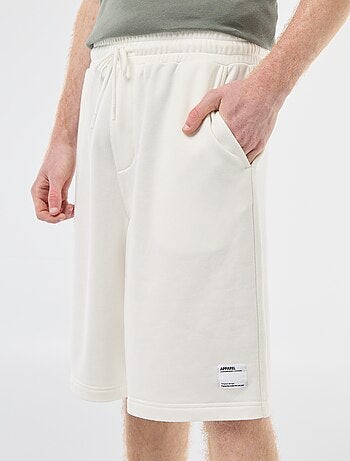 Short con patch in cotone tinta unita