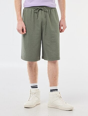 Short con patch in cotone tinta unita