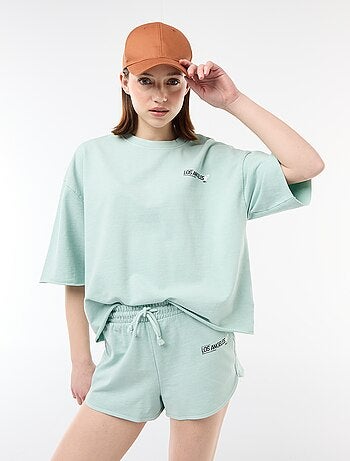 Short corto in french terry con scritta