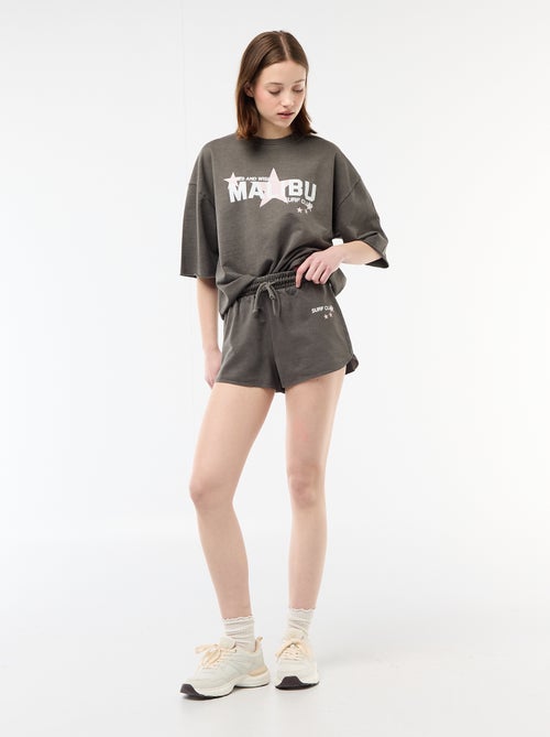 Short corto in french terry con scritta - Kiabi