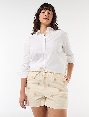 Short grezzo con ricami a sole