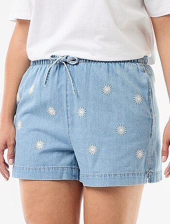 Short grezzo con ricami a sole