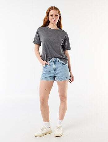 Short in denim con tasche intrecciate