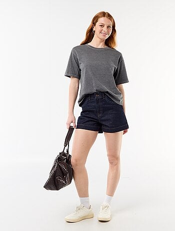 Short in denim con tasche intrecciate