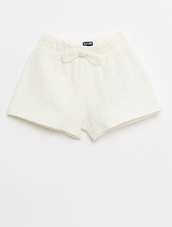 Short in maglia jacquard a tinta unita con fiocco decorativo