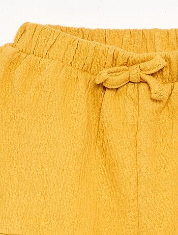 Short in maglia stropicciata tinta unita