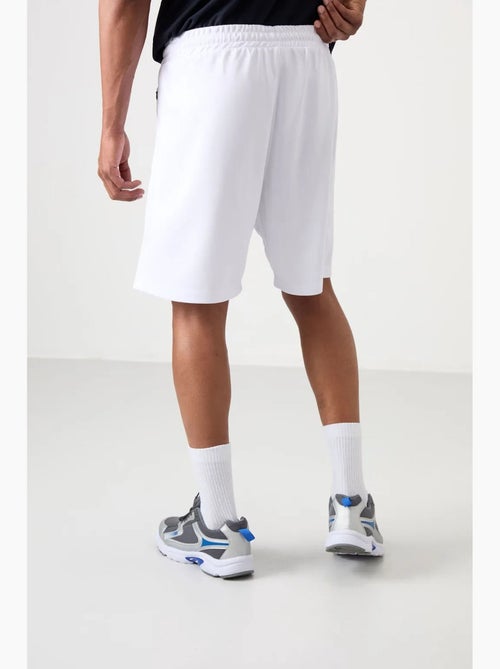 Short jogging tinta unita in maglia tommy - Kiabi