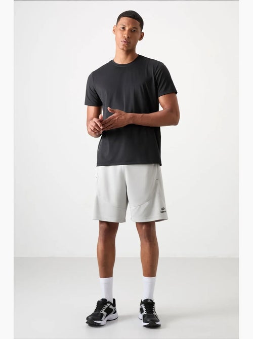 Short jogging tinta unita in maglia tommy - Kiabi