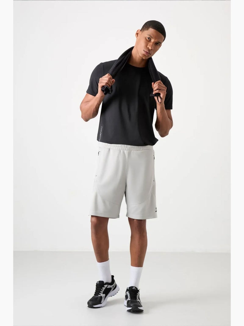 Short jogging tinta unita in maglia tommy Bianco sporco - Kiabi