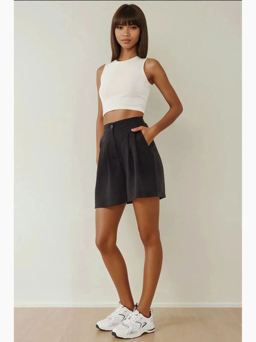 Shorts a vita alta plissettati in lyocell soft touch hiccup - Kiabi Shorts a vita alta plissettati in lyocell soft touch hiccup - Kiabi