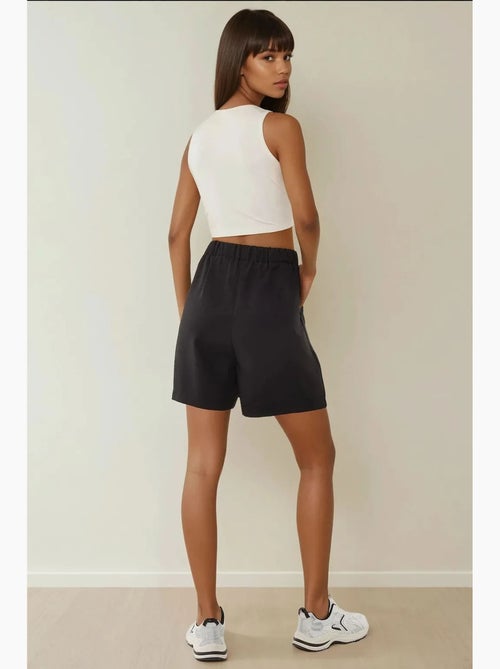 Shorts a vita alta plissettati in lyocell soft touch hiccup - Kiabi Shorts a vita alta plissettati in lyocell soft touch hiccup - Kiabi