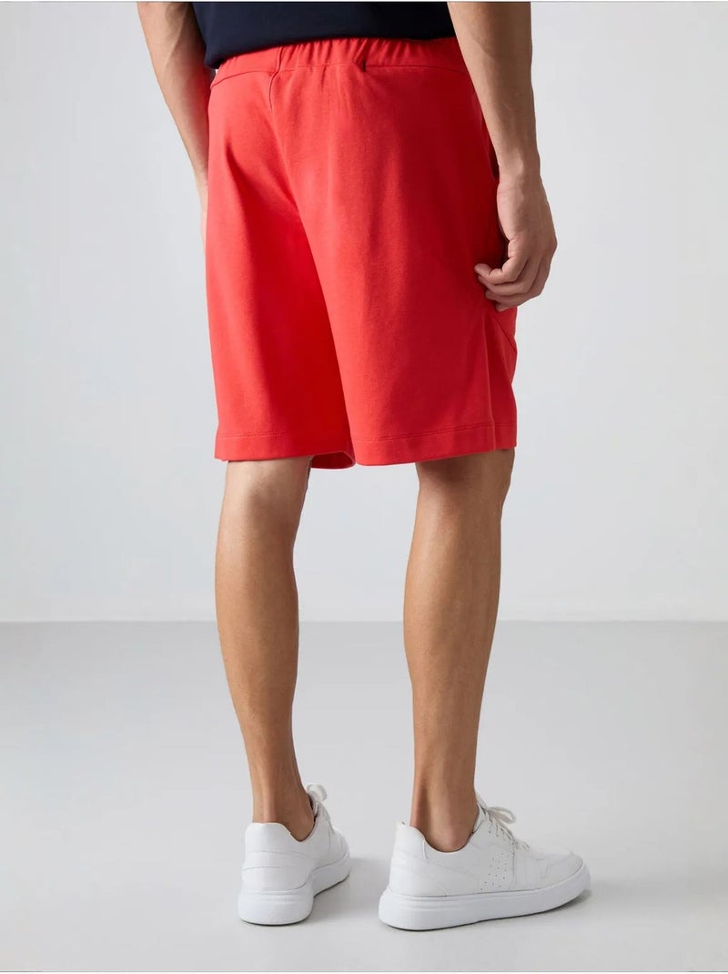 Shorts da uomo in misto cotone tommy Arancione - Kiabi