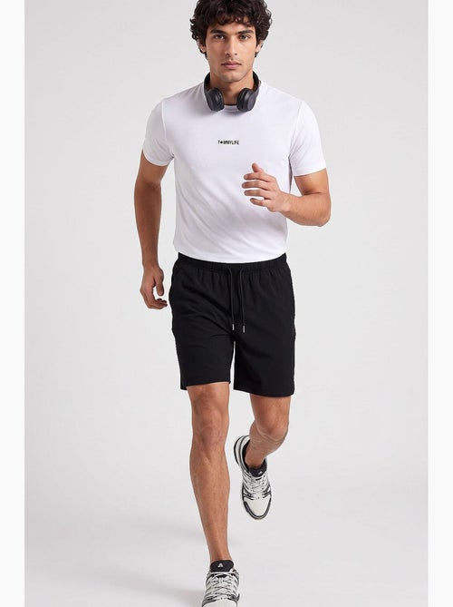 Shorts dal taglio pulito tommy - Kiabi Shorts dal taglio pulito tommy - Kiabi