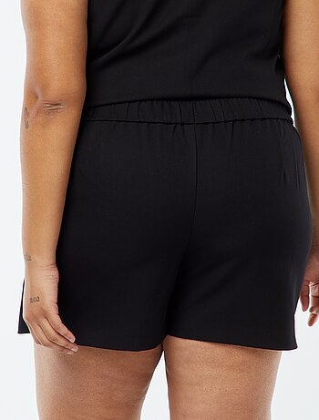 Shorts effetto gonna a vita alta