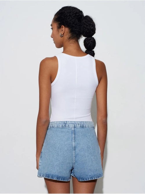 Shorts in denim di cotone a vita alta a gamba ampia dilvin - Kiabi Shorts in denim di cotone a vita alta a gamba ampia dilvin - Kiabi