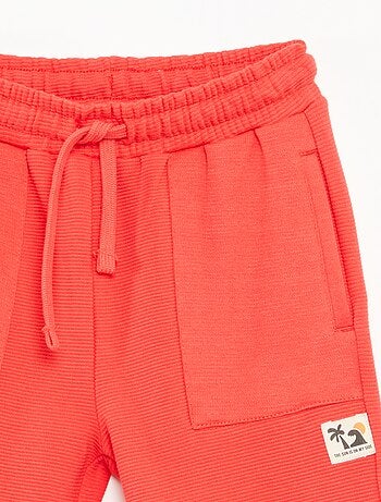 Shorts in maglia fantasia con 2 tasche