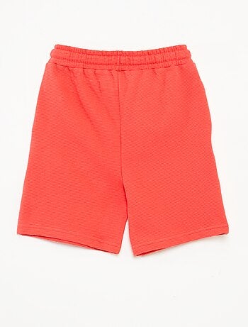Shorts in maglia fantasia con 2 tasche