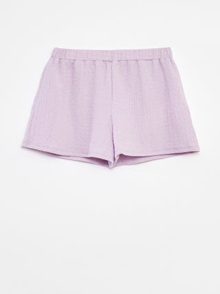Shorts in maglia goffrata con motivi
