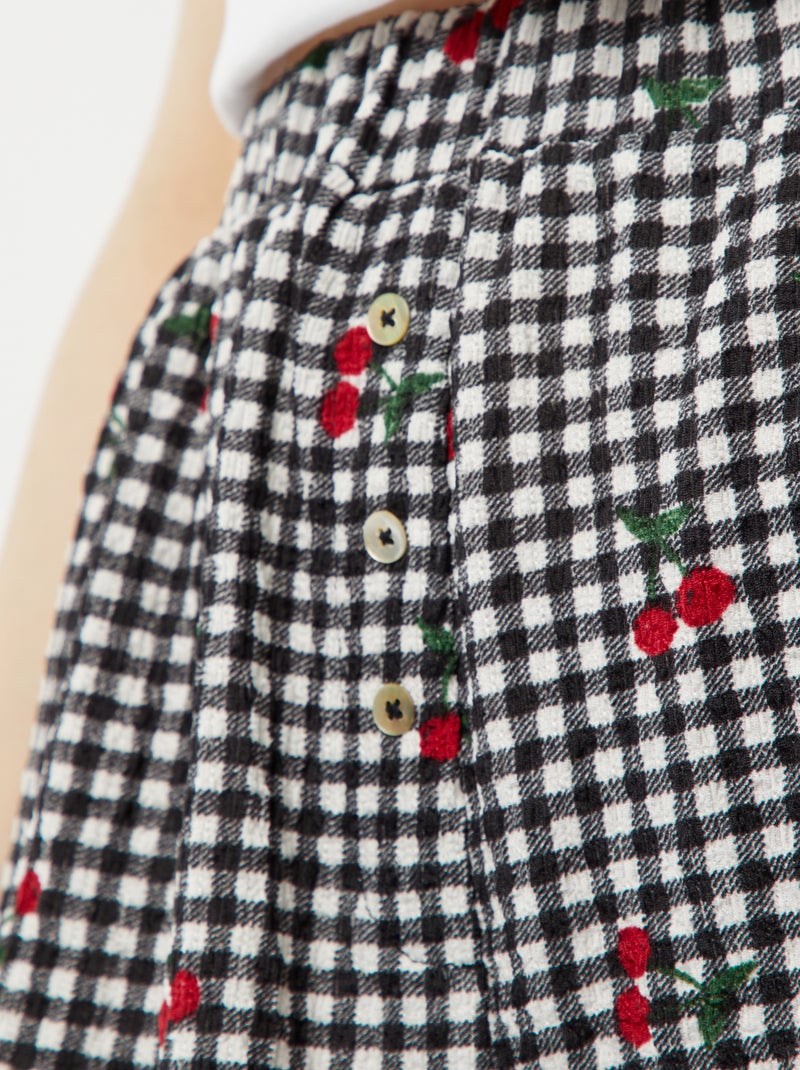 Shorts in maglia goffrata con motivo NERO - Kiabi