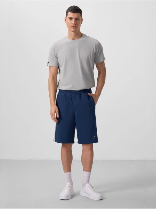 Shorts in maglia oversize in misto cotone tommy - Kiabi Shorts in maglia oversize in misto cotone tommy - Kiabi