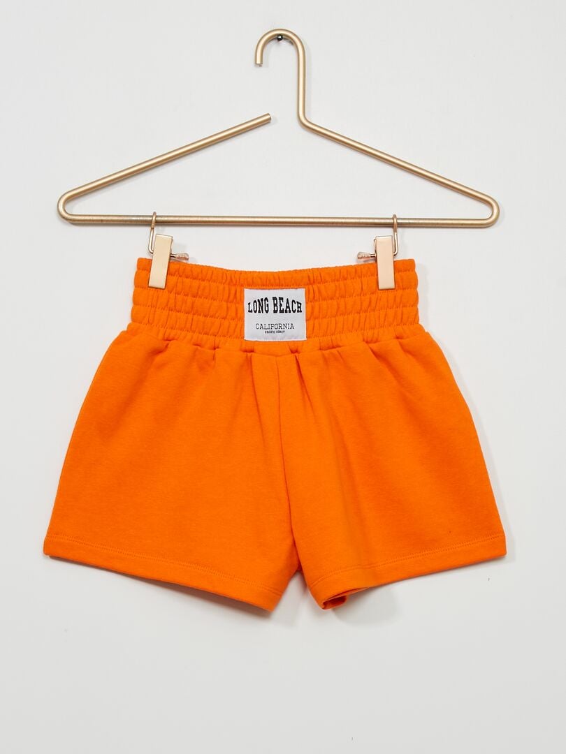 Shorts in tessuto felpato con etichetta grande ARANCIONE - Kiabi