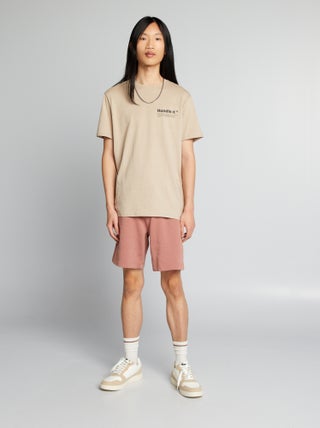 Shorts in tessuto felpato con tasche con zip