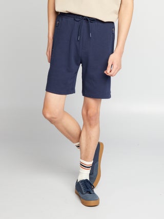Shorts in tessuto felpato con tasche con zip