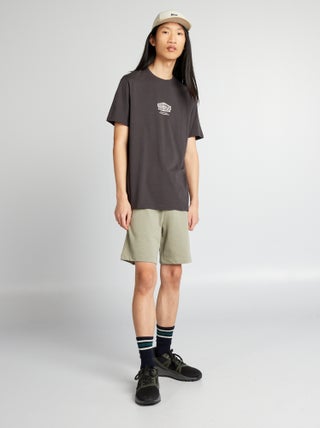 Shorts in tessuto felpato con tasche con zip
