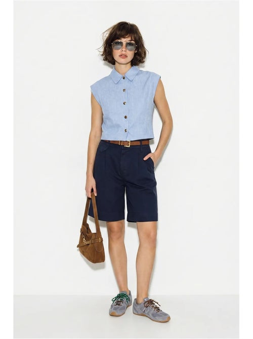 Shorts sartoriali a vita alta con cintura lucci - Kiabi Shorts sartoriali a vita alta con cintura lucci - Kiabi