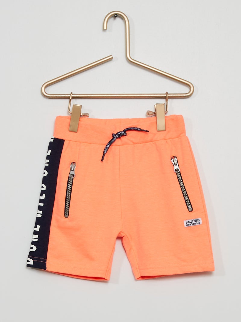 Shorts tasche con zip in tessuto felpato corallo - Kiabi