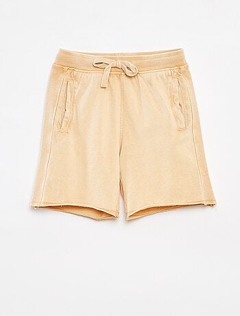 Shorts tinta unita con effetto delavé