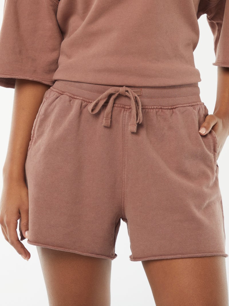 Shorts tinta unita délavé con vita elasticizzata Rosso - Kiabi