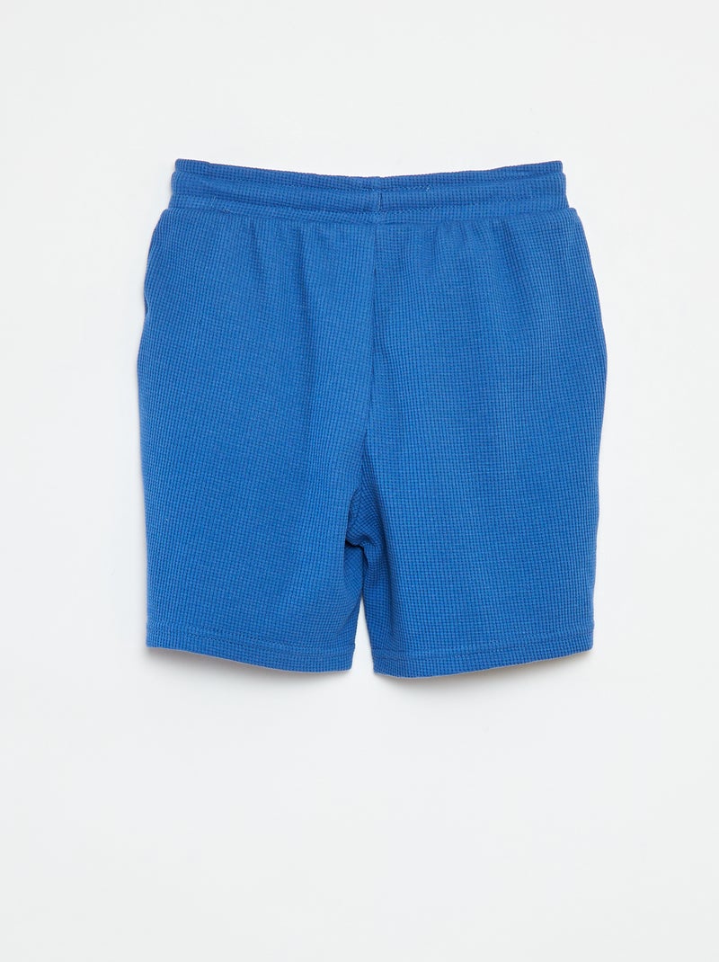 Shorts tinta unita in tessuto goffrato BLU - Kiabi
