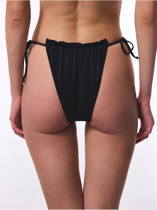 Slip bikini a vita bassa con laccetti super frill penti - Kiabi Slip bikini a vita bassa con laccetti super frill penti - Kiabi