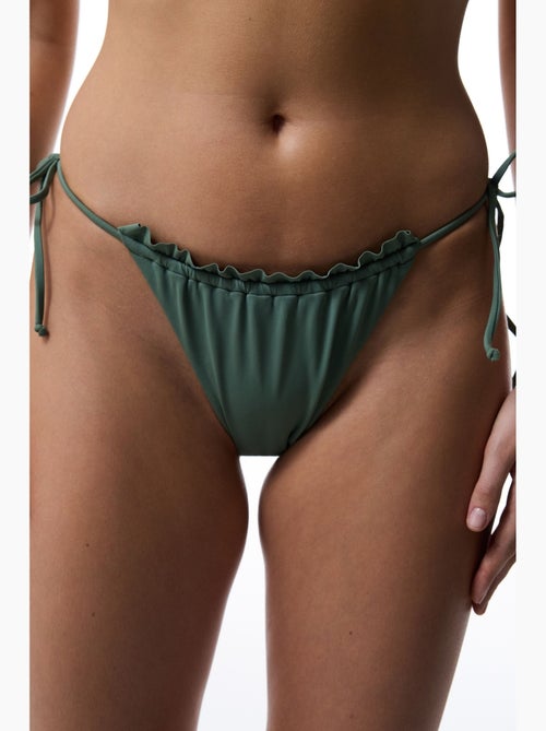 Slip bikini a vita bassa con laccetti super frill penti - Kiabi Slip bikini a vita bassa con laccetti super frill penti - Kiabi