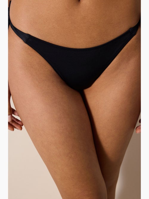 Slip bikini basic con laccetti penti - Kiabi Slip bikini basic con laccetti penti - Kiabi
