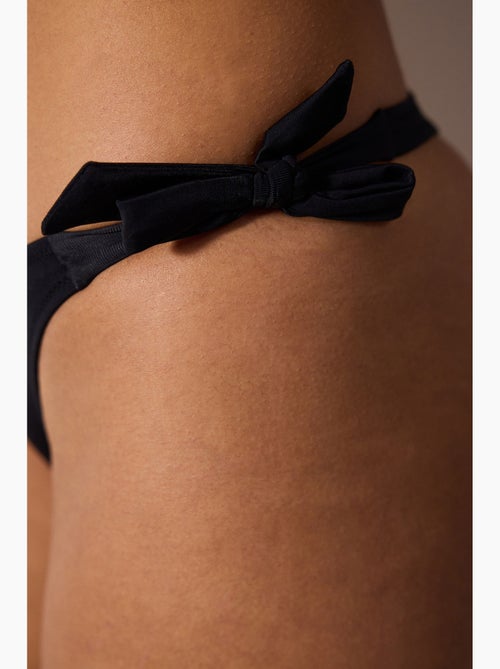 Slip bikini basic con laccetti penti - Kiabi Slip bikini basic con laccetti penti - Kiabi