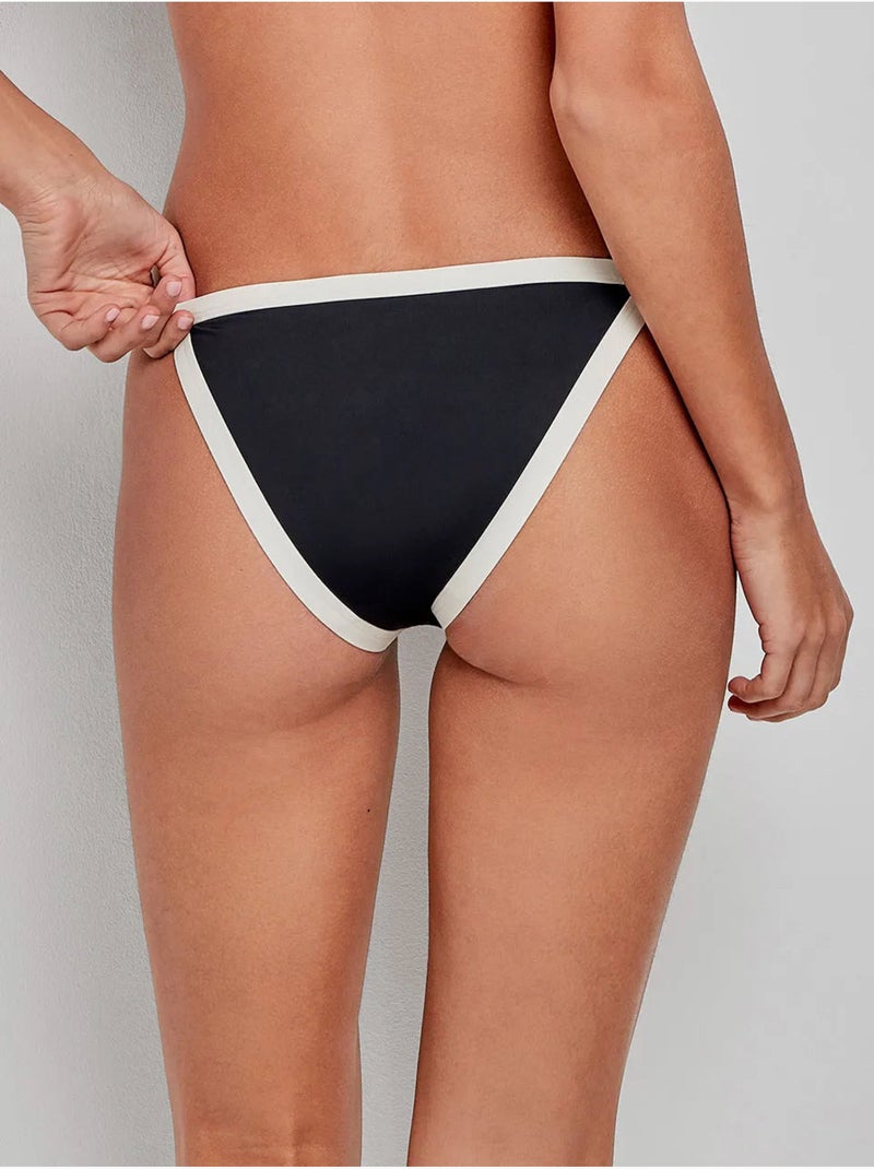 Slip bikini bordi a contrasto Nero - Kiabi
