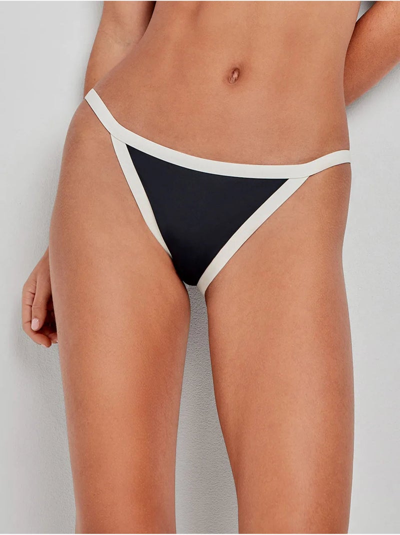 Slip bikini bordi a contrasto Nero - Kiabi