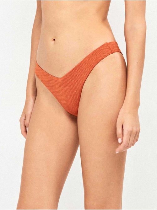 Slip bikini brasiliano a coste lurex dorato - Kiabi Slip bikini brasiliano a coste lurex dorato - Kiabi