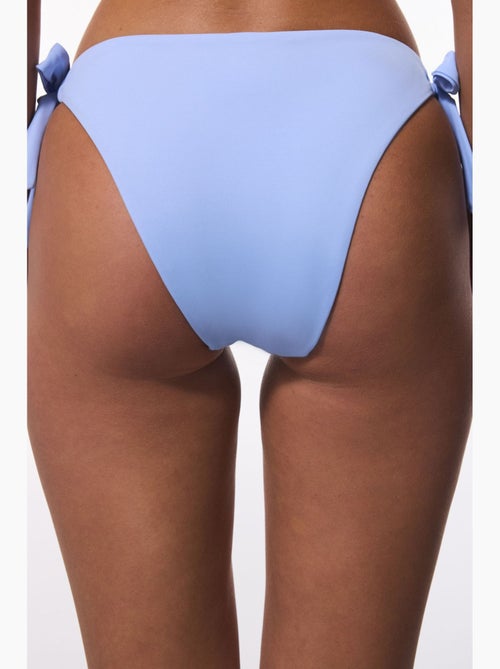 Slip bikini brasiliano a vita bassa penti - Kiabi Slip bikini brasiliano a vita bassa penti - Kiabi