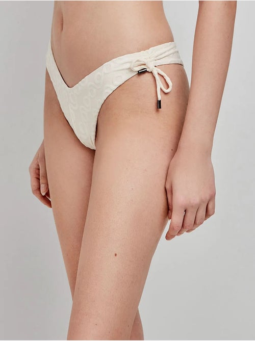 Slip bikini brasiliano taglio a v - Kiabi Slip bikini brasiliano taglio a v - Kiabi