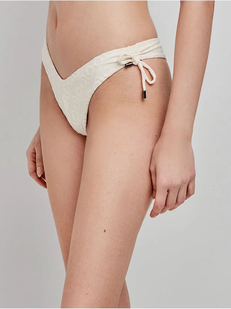 Slip bikini brasiliano taglio a v Beige - Kiabi