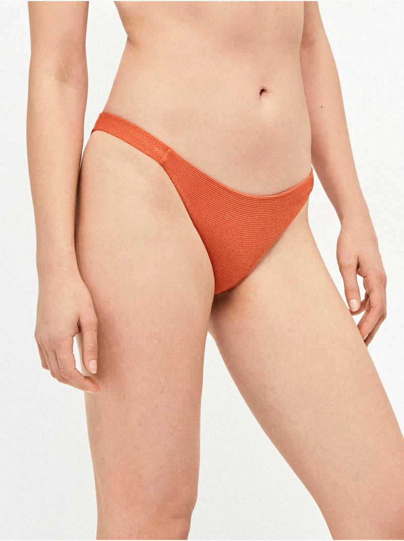 Slip bikini classico in tessuto strutturato con lurex e con dettagli arricciati ai lati. Terracotta - Kiabi