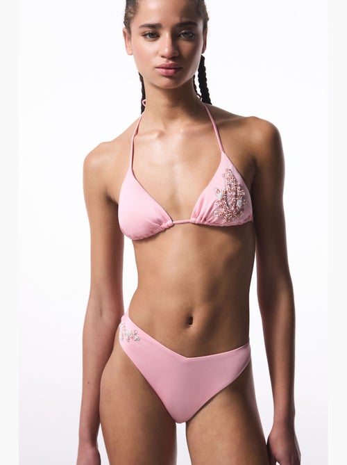 Slip bikini con dettaglio di perline e taglio a v penti - Kiabi Slip bikini con dettaglio di perline e taglio a v penti - Kiabi