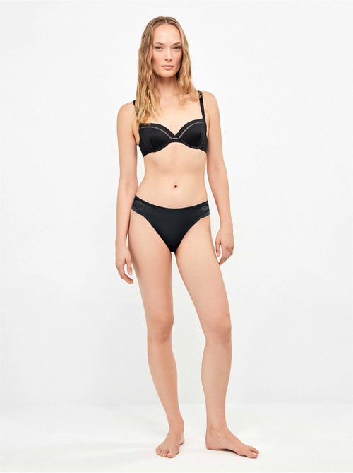 Slip bikini con dettaglio traforato sui lati - Kiabi Slip bikini con dettaglio traforato sui lati - Kiabi