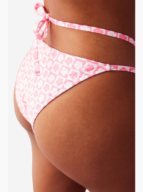 Slip bikini lika cross con stampa floreale e dettaglio accessorio penti - Kiabi Slip bikini lika cross con stampa floreale e dettaglio accessorio penti - Kiabi