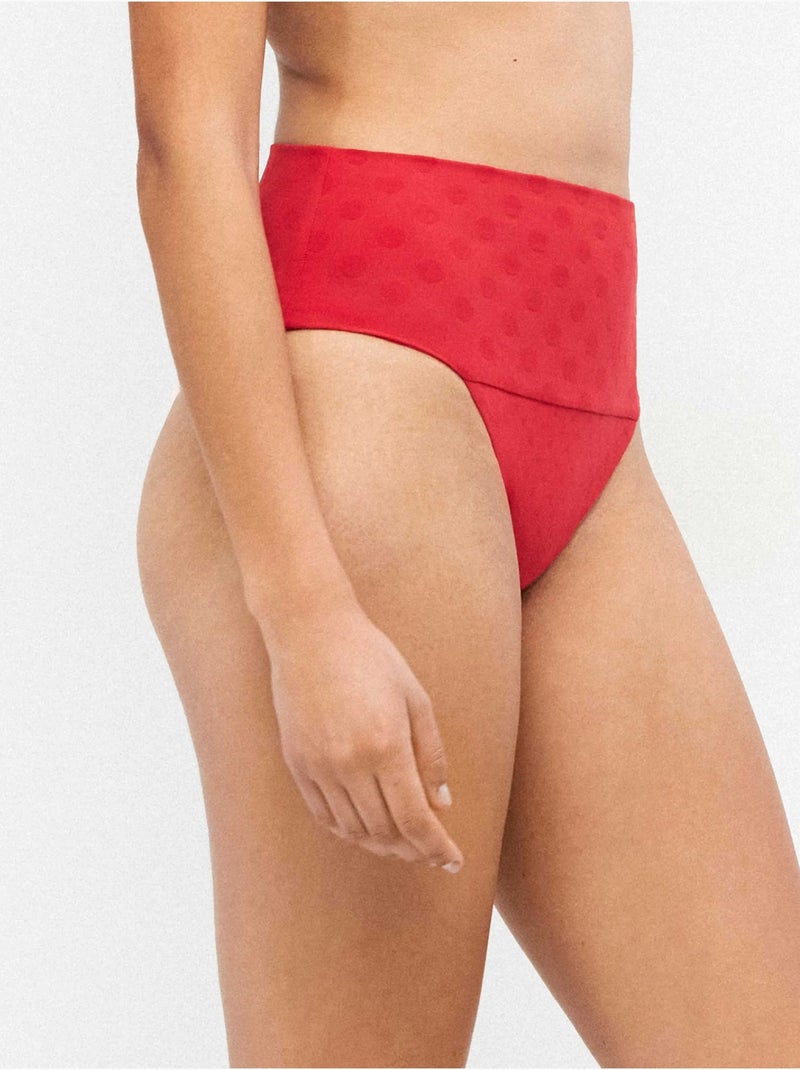 Slip bikini multiposizione jacquard a pois Rosso - Kiabi