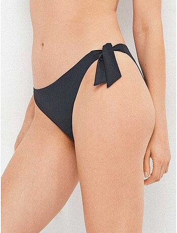 Slip bikini regolabile sui lati