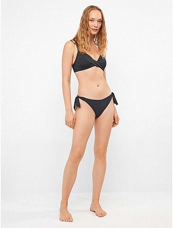 Slip bikini regolabile sui lati